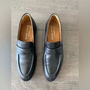 Black leather slip on shoes